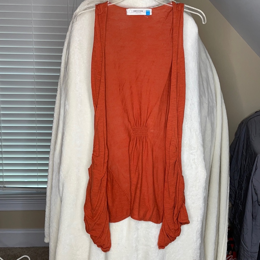 Orange Anthropologie sleeveless cardigan